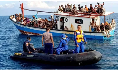 Indonesian fishermen rescue dozens of Rohingya after boat capsizes