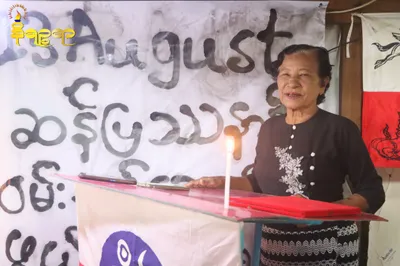 Leading Rakhine woman leader Daw Nyo Aye taken away by the police