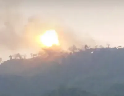 Junta forces use military helicopters to relocate weapons, destroy unmovable ones by fire before abandoning Myebon base